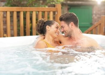 Couple having an intimate moment at hot tub